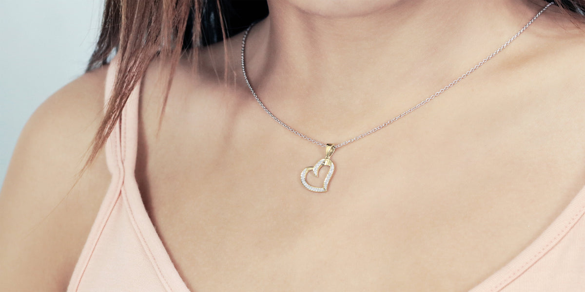 Round White Diamond Heart Pendant with 18 Inch Silver Chain in 10K Yellow Gold D25627